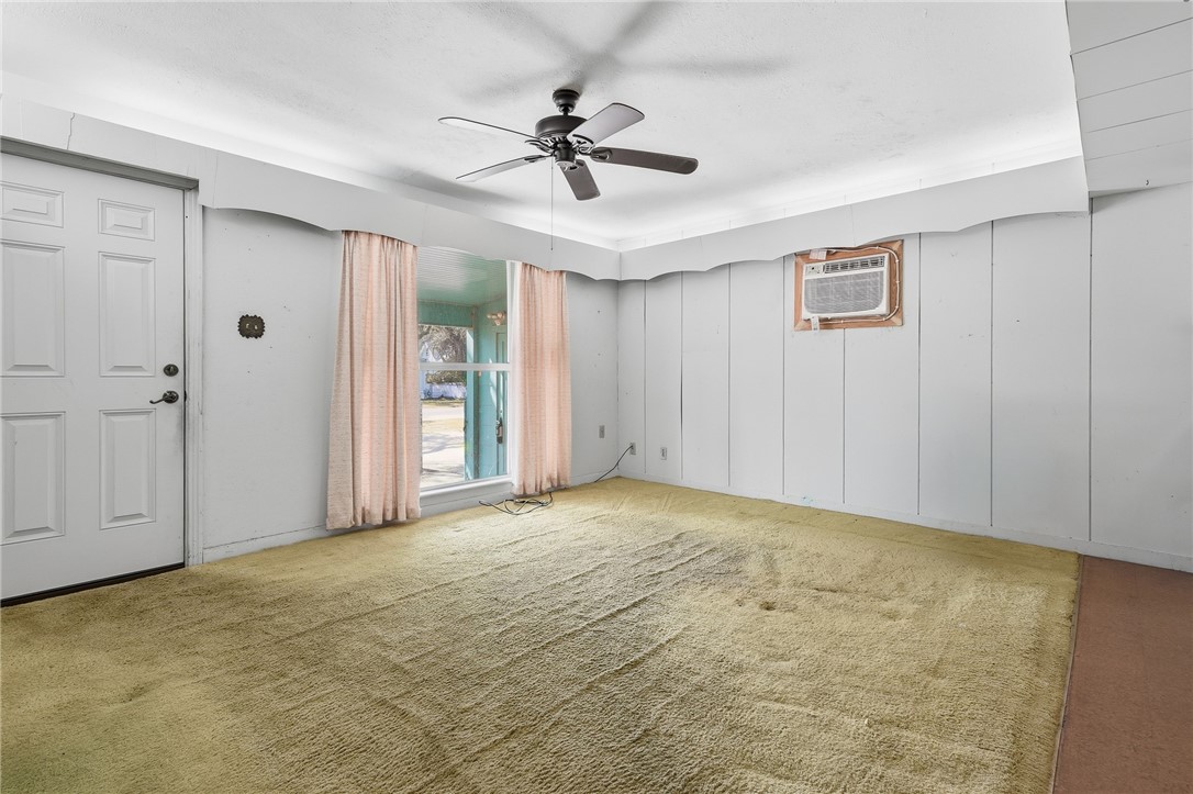 301 Laurel Street Fulton, TX 78382 - Photo 5 of 20 a view of an empty room with a ceiling fan