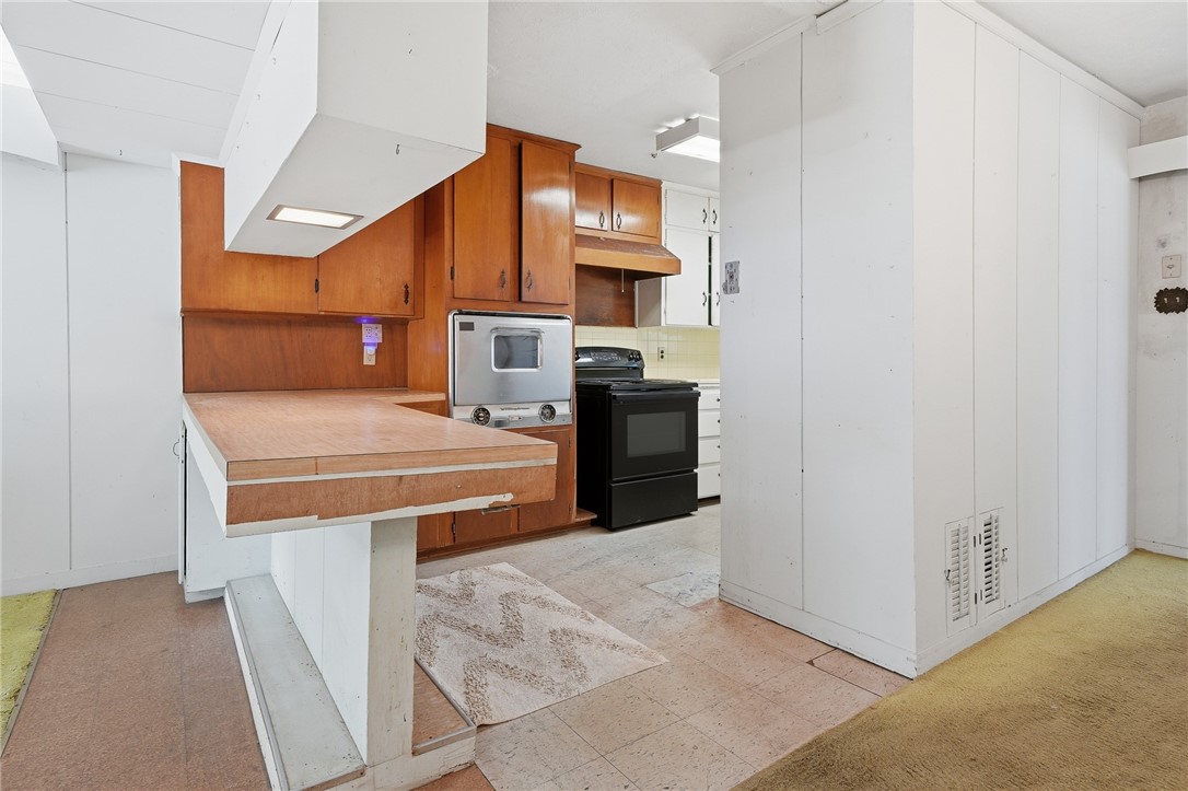 301 Laurel Street Fulton, TX 78382 - Photo 8 of 20 a view of kitchen and utility room