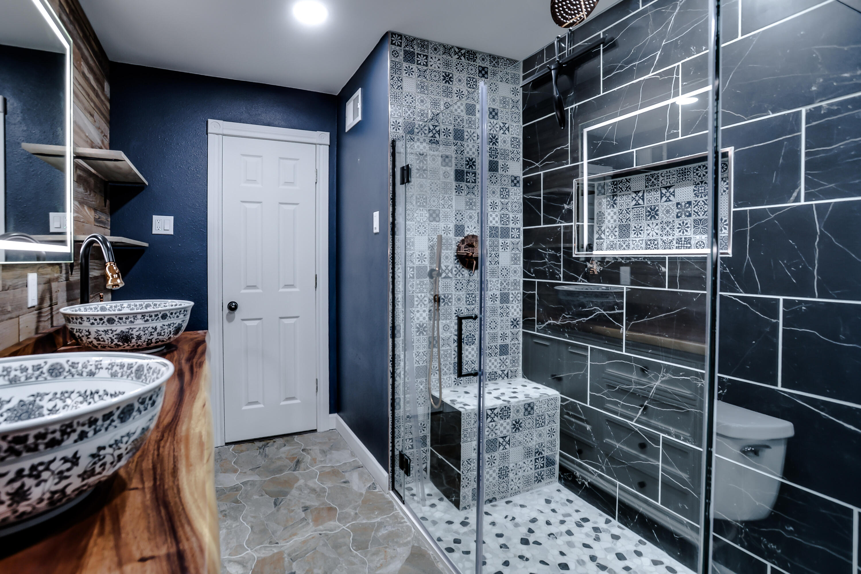 3615 47th Street Lubbock, TX 79413 - Photo 27 of 36 a bathroom with a sink toilet and shower