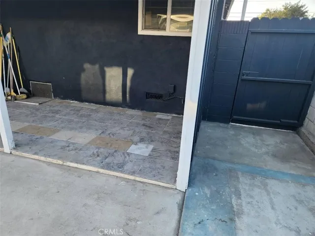 a view of storage and utility room with stairs