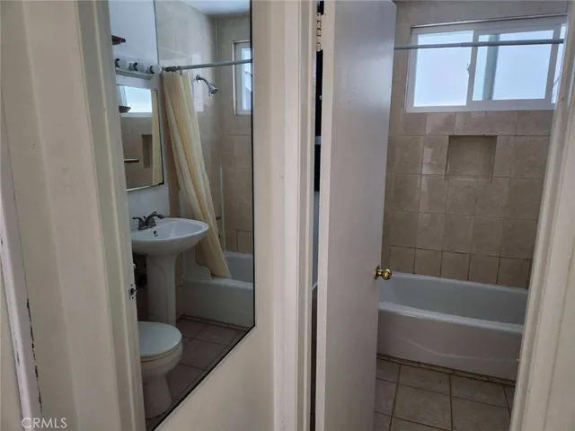 a view of cabinets and wooden floor