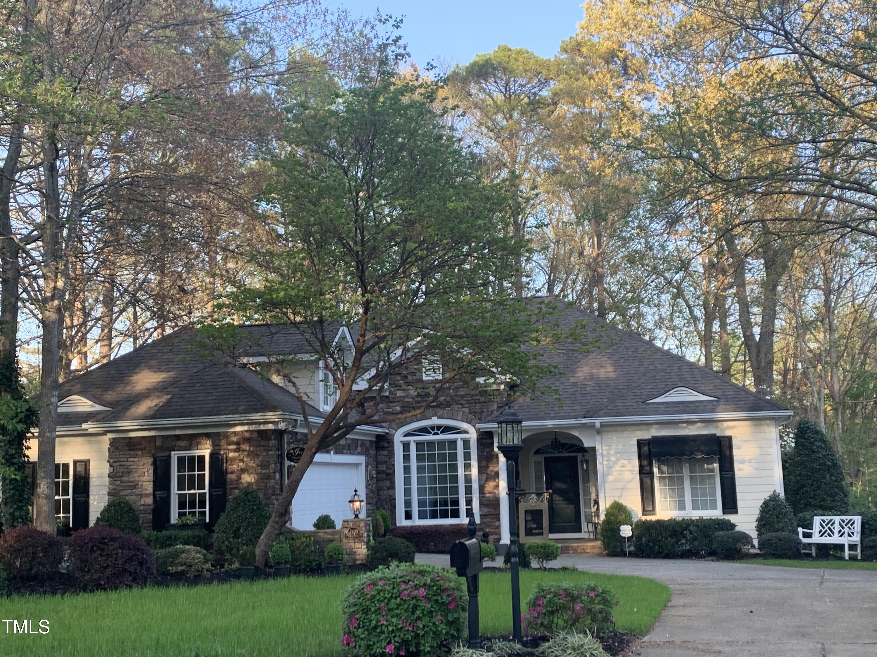 7620 The Pointe Raleigh, NC 27615 - Photo 1 of 3 front view of a house with a garden