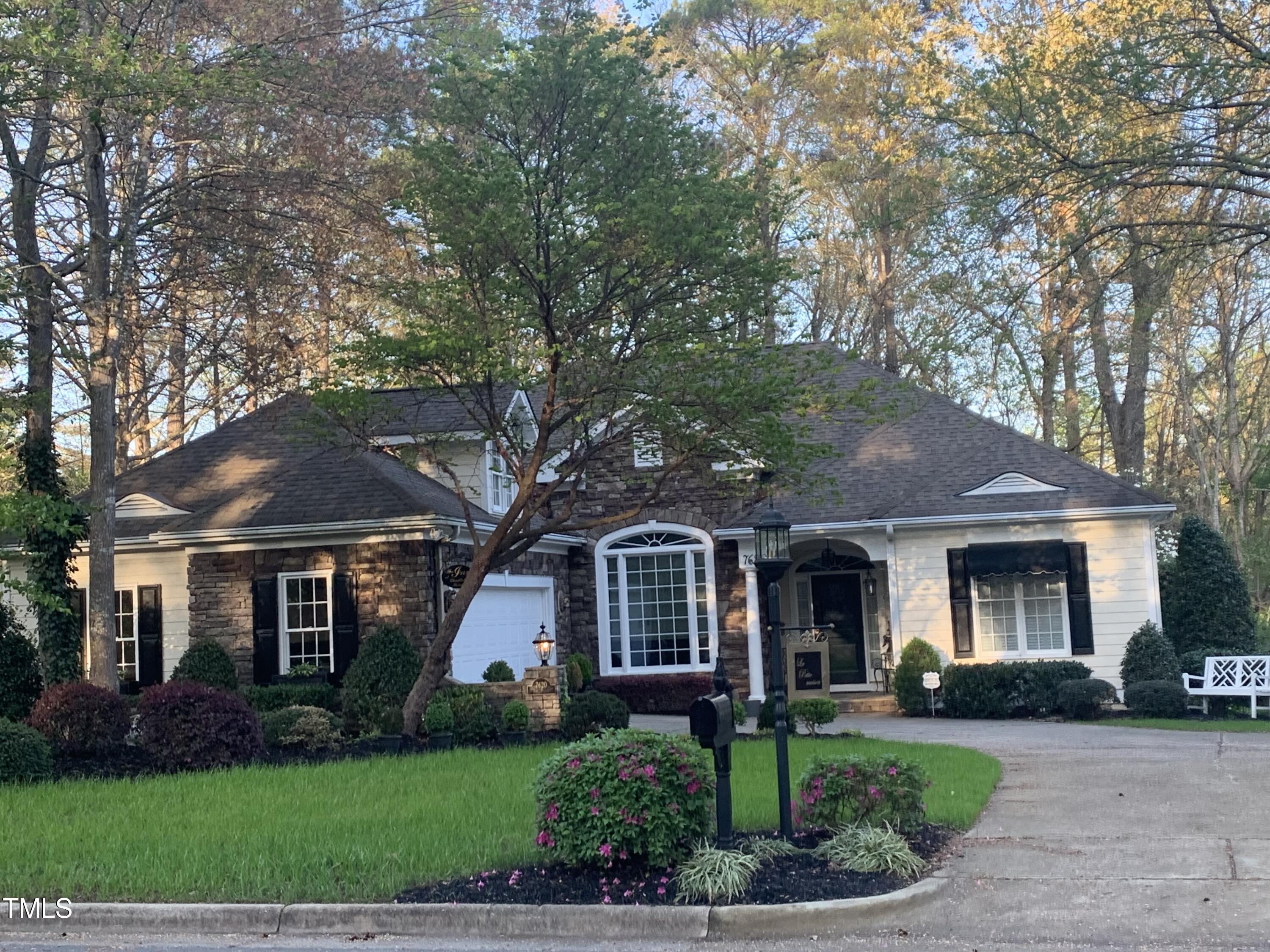 7620 The Pointe Raleigh, NC 27615 - Photo 2 of 3 front view of a house with a yard