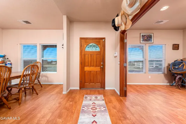 a bathroom with a tub a sink and a shower