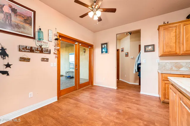 a bathroom with a sink mirror vanity and toilet