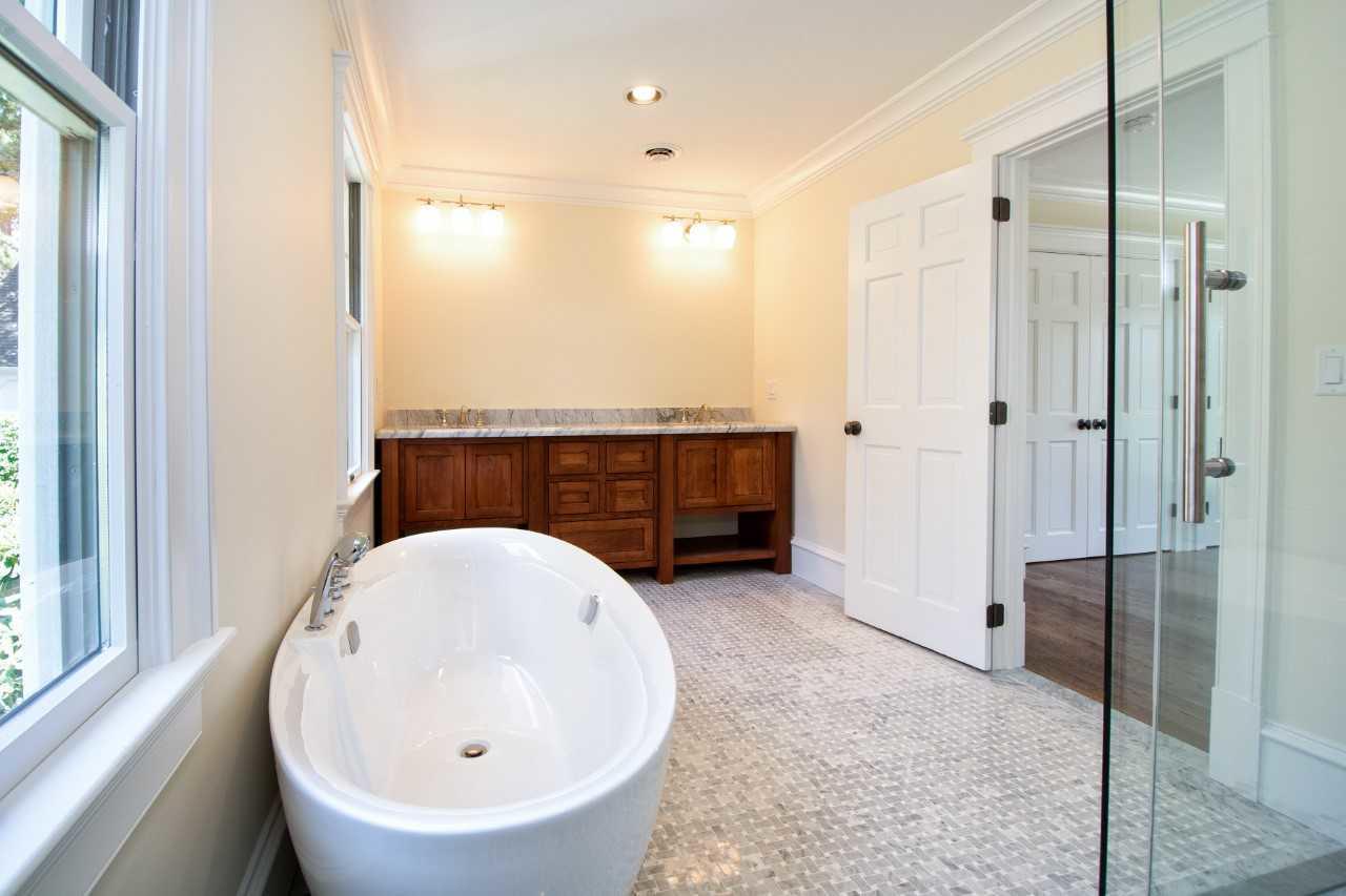 140 Pineleigh Path Osterville, MA 02655 - Photo 15 of 29 a bathroom with a sink and a mirror