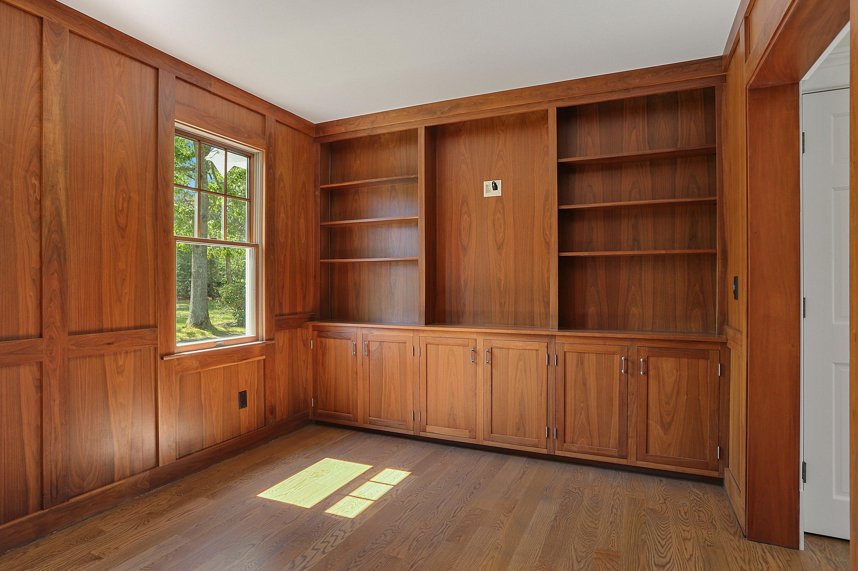 140 Pineleigh Path Osterville, MA 02655 - Photo 16 of 29 a view of an empty room with a window and wooden floor