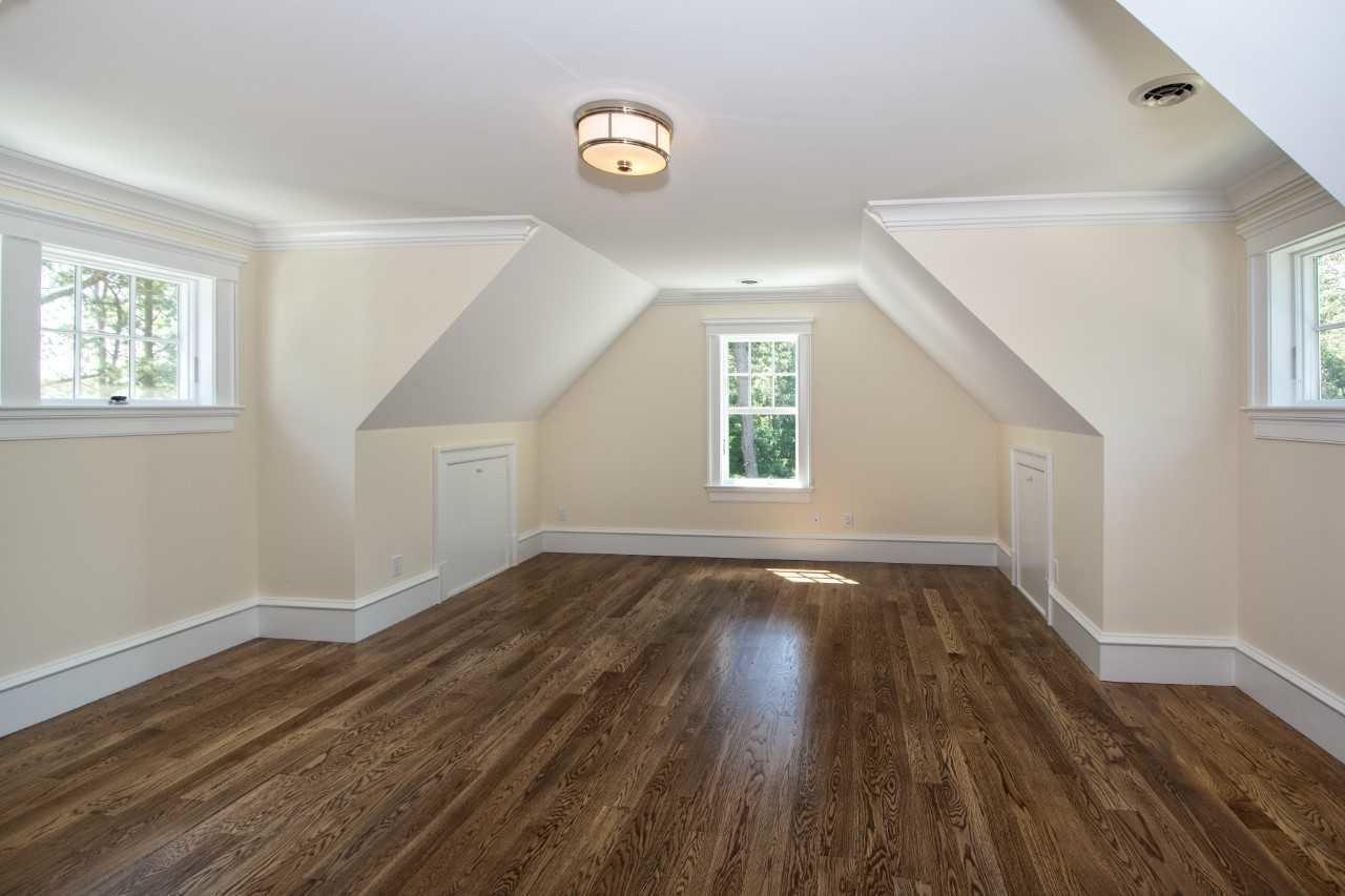 140 Pineleigh Path Osterville, MA 02655 - Photo 19 of 29 a view of an empty room with wooden floor and a window