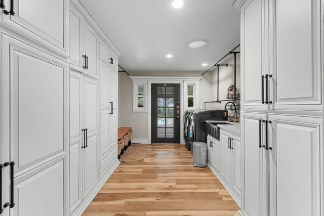 a bedroom with a bed and a cabinets