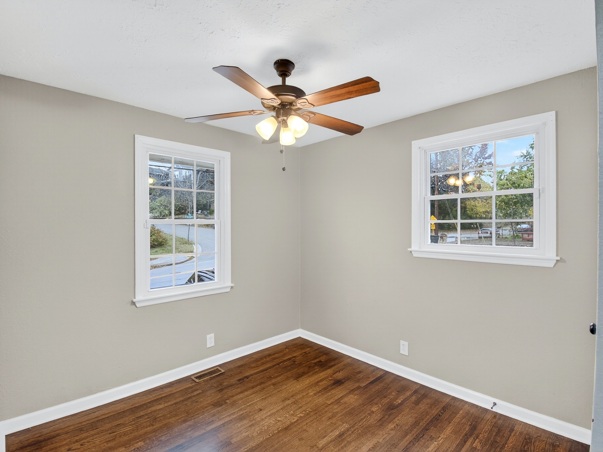2509 Old Matthews Road Nashville, TN 37207 - Photo 25 of 45 a view of an empty room with window and wooden floor