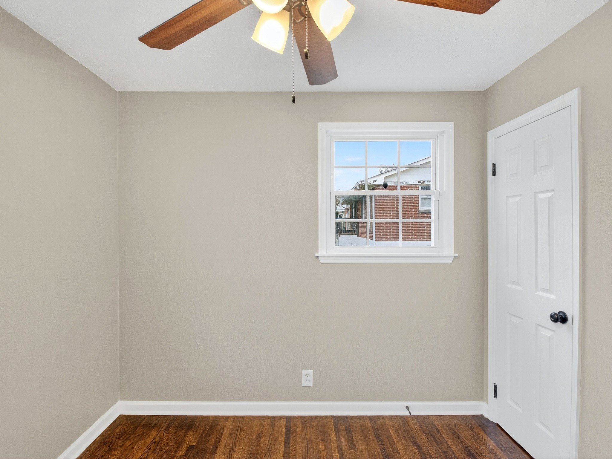 2509 Old Matthews Road Nashville, TN 37207 - Photo 26 of 45 an empty room with a window and wooden floor
