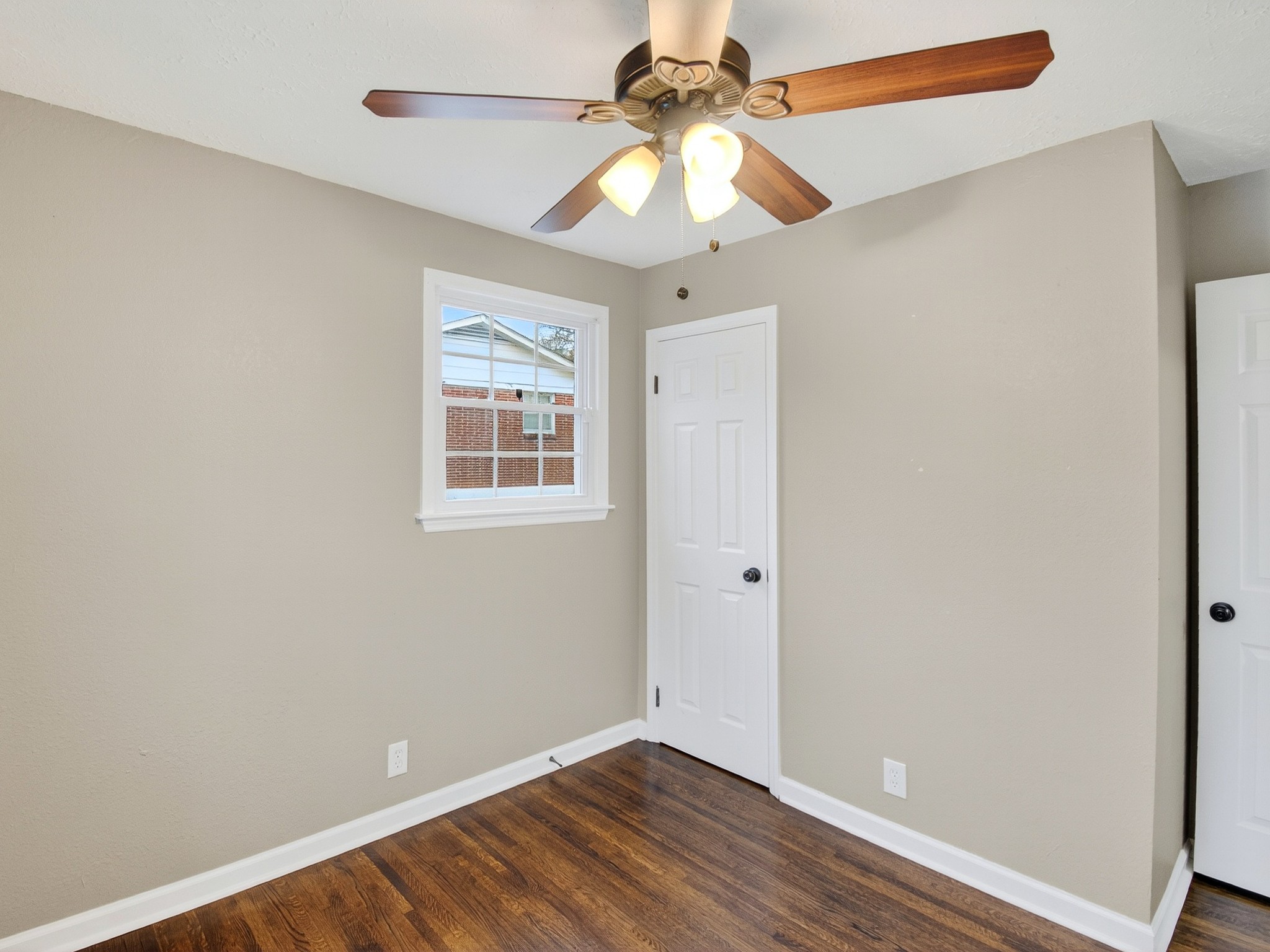 2509 Old Matthews Road Nashville, TN 37207 - Photo 27 of 45 an empty room with a window and a fan