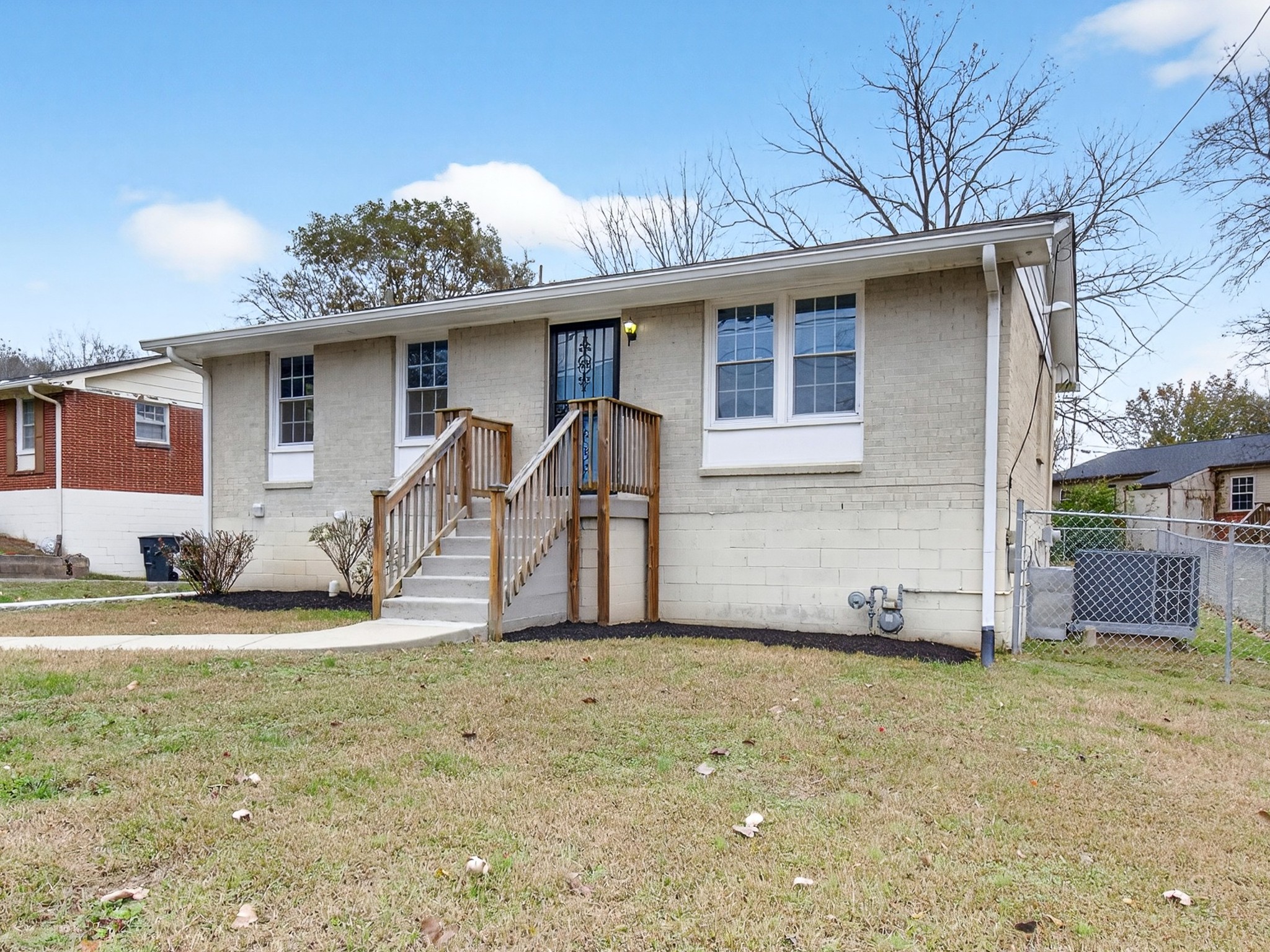 2509 Old Matthews Road Nashville, TN 37207 - Photo 3 of 45 a front view of a house with a yard