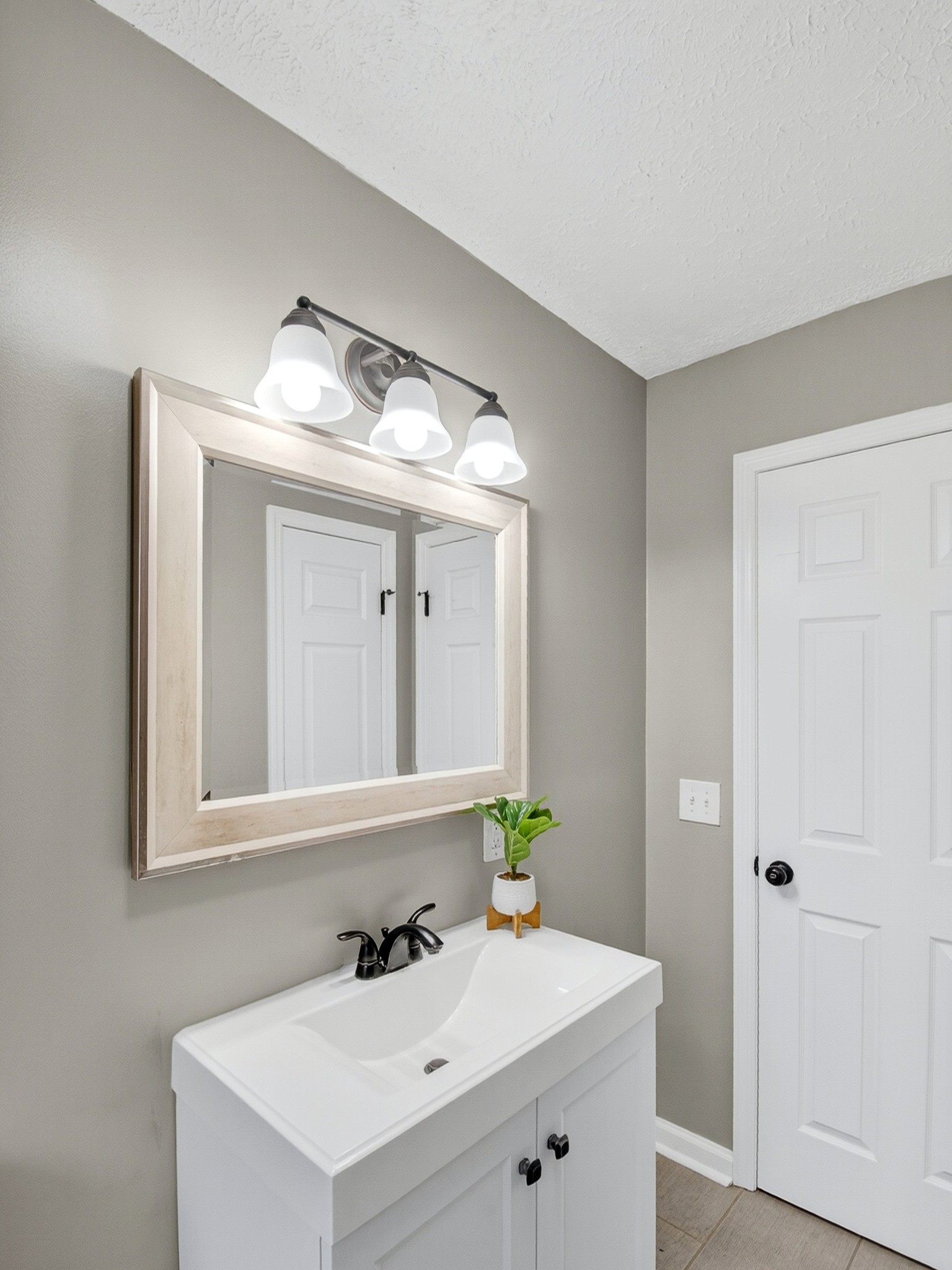 2509 Old Matthews Road Nashville, TN 37207 - Photo 31 of 45 a bathroom with a sink and a mirror