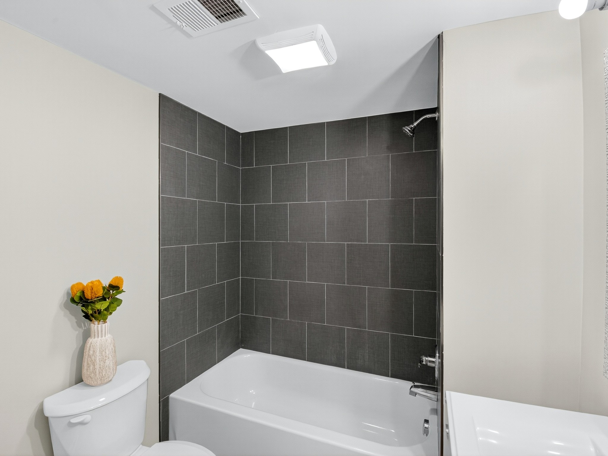 2509 Old Matthews Road Nashville, TN 37207 - Photo 32 of 45 a bathroom with a tub a toilet and a shower