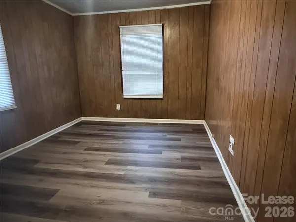 a view of wooden floor and staircase