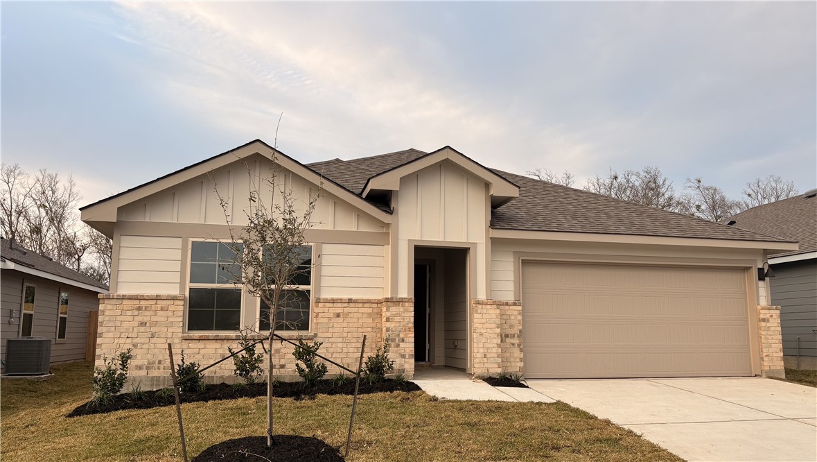 a front view of a house with yard