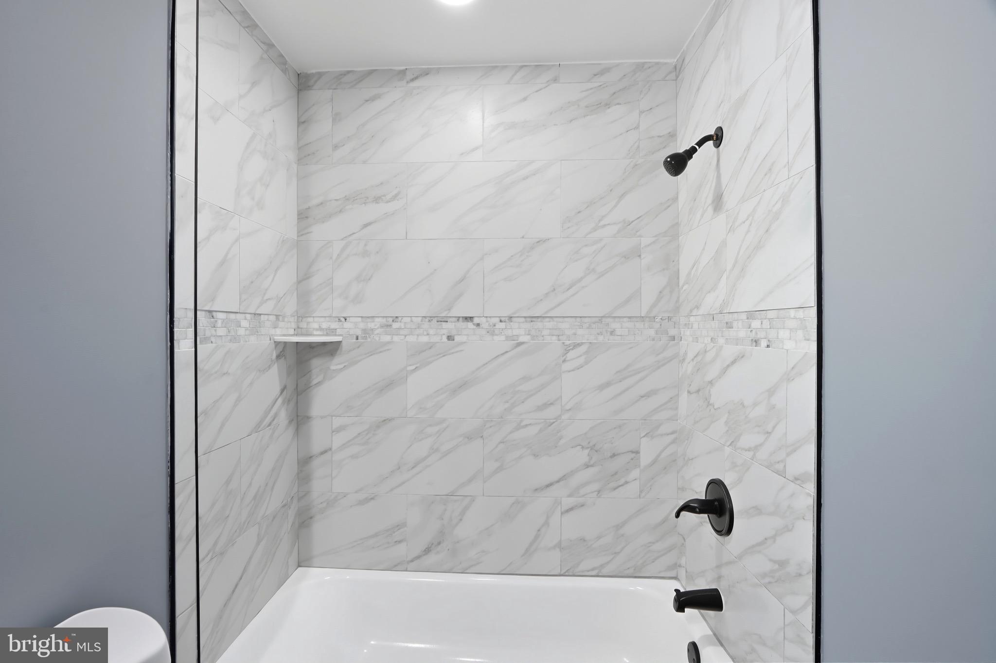 1309 East Patapsco Avenue Baltimore, MD 21225 - Photo 19 of 34 a bathroom with a shower