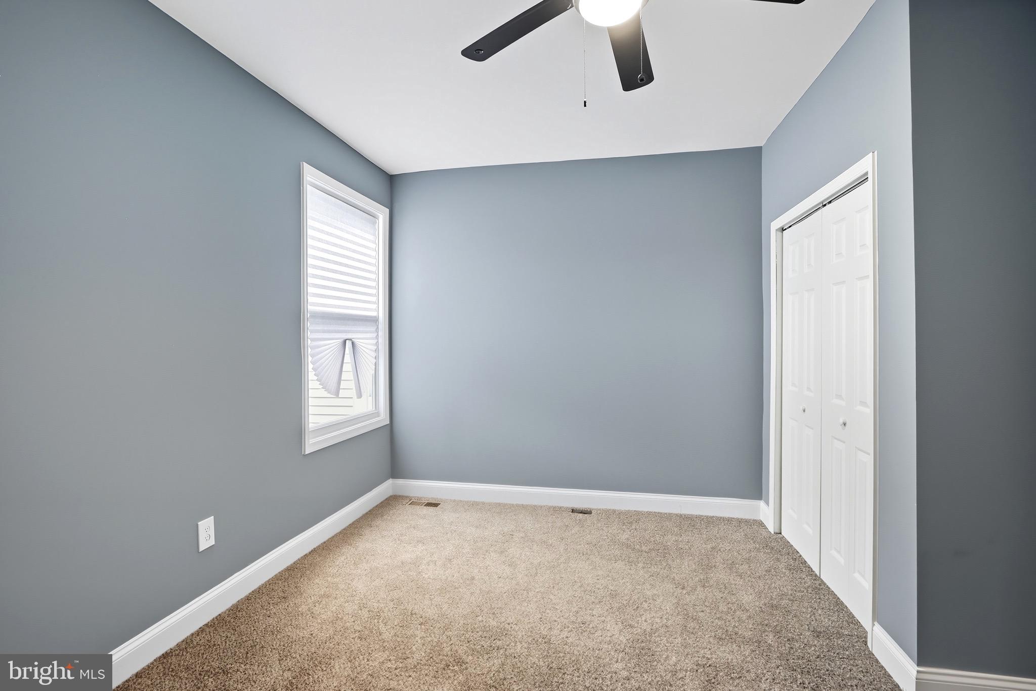 1309 East Patapsco Avenue Baltimore, MD 21225 - Photo 20 of 34 an empty room with windows and closet