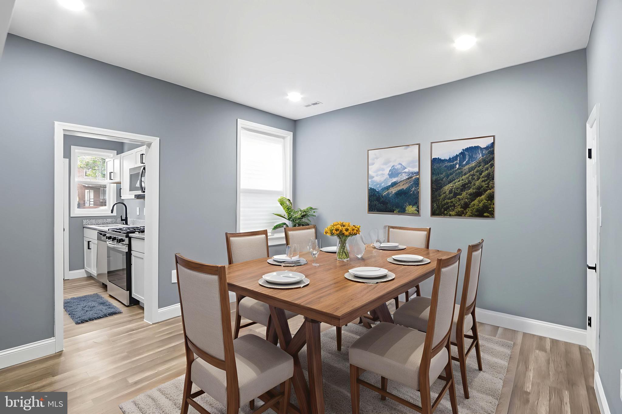 1309 East Patapsco Avenue Baltimore, MD 21225 - Photo 33 of 34 a view of a dining room with furniture and wooden floor