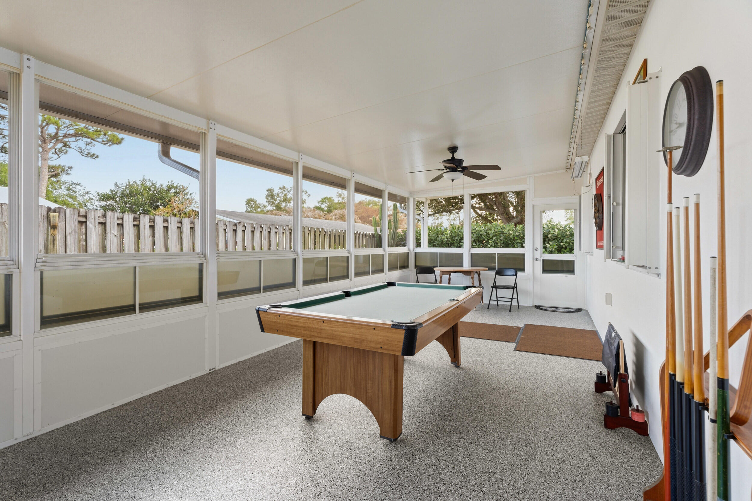 1341 Southeast Seashell Lane Stuart, FL 34996 - Photo 21 of 24 a room with pool table and windows