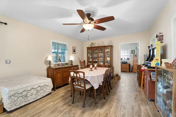 a bedroom with a bed and a table