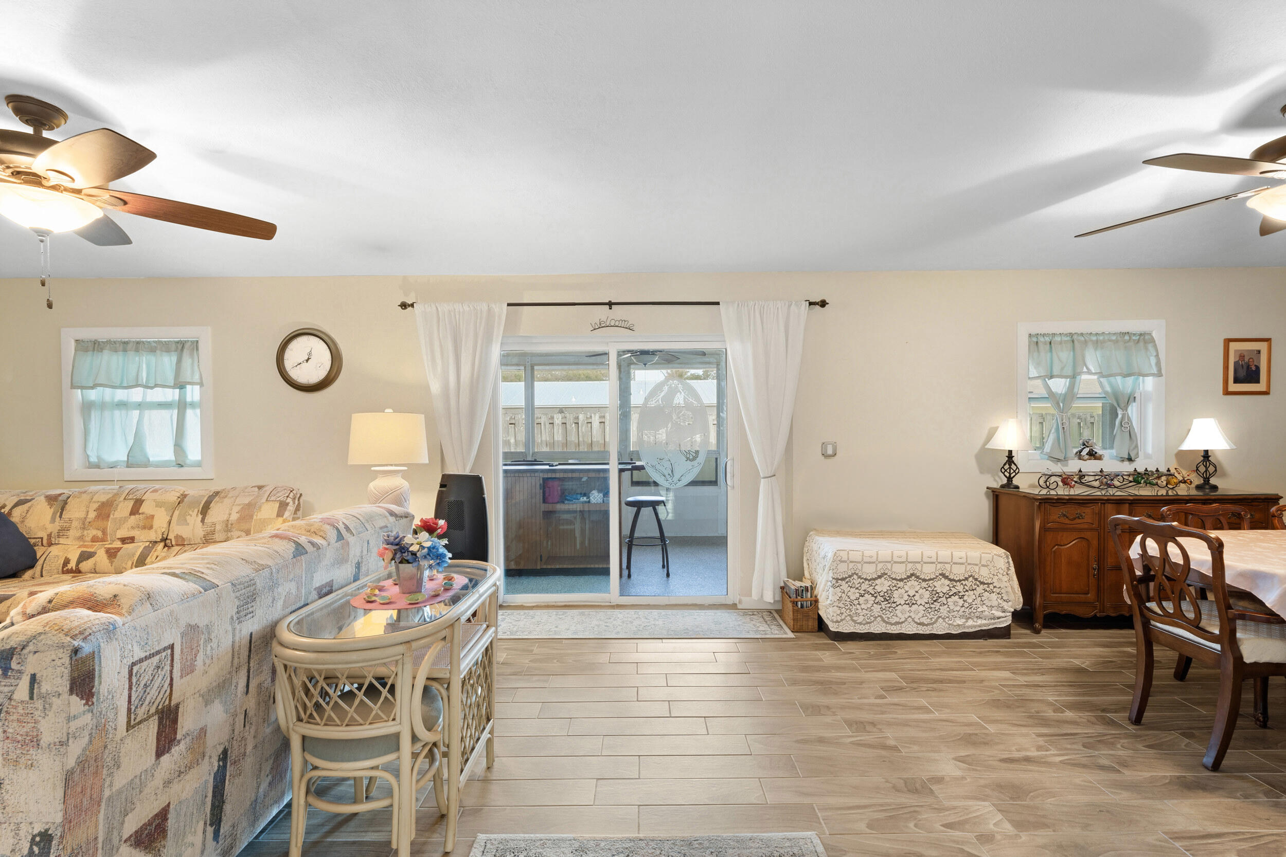 1341 Southeast Seashell Lane Stuart, FL 34996 - Photo 10 of 24 a living room with furniture and wooden floor