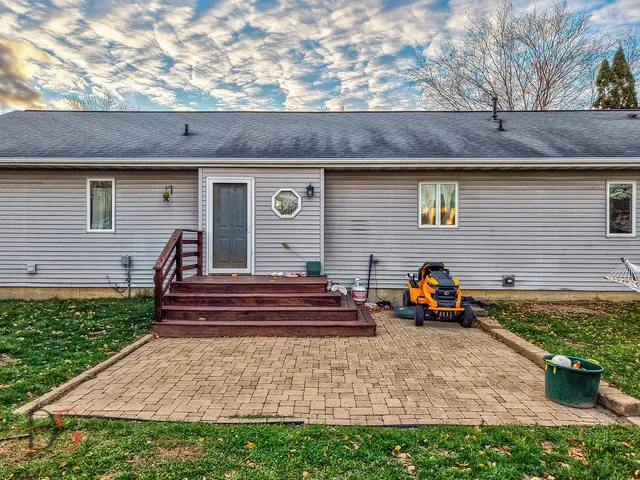a front view of a house with patio