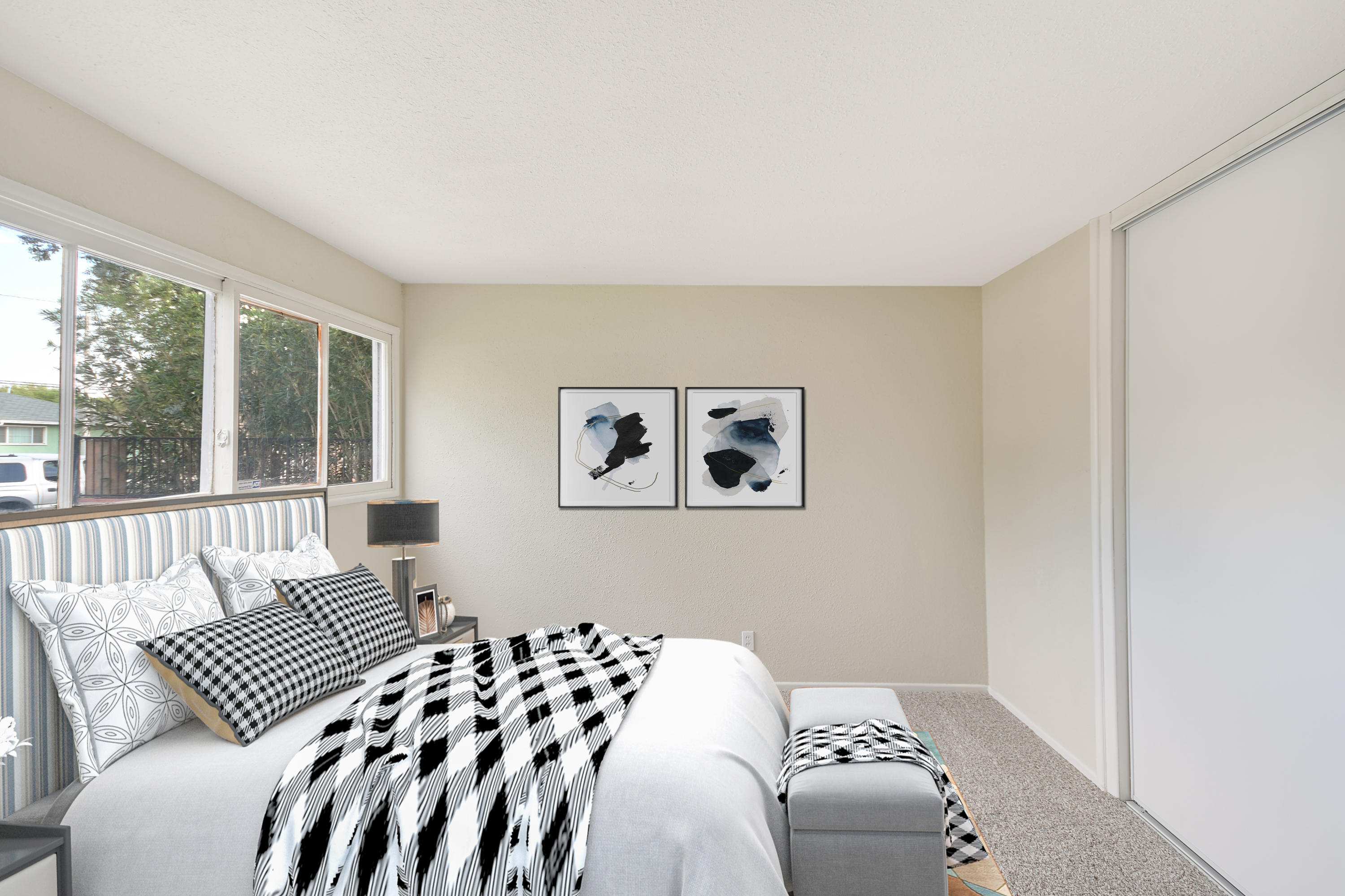 44325 3rd Street East Lancaster, CA 93535 - Photo 11 of 15 a bedroom with a bed and wooden floor