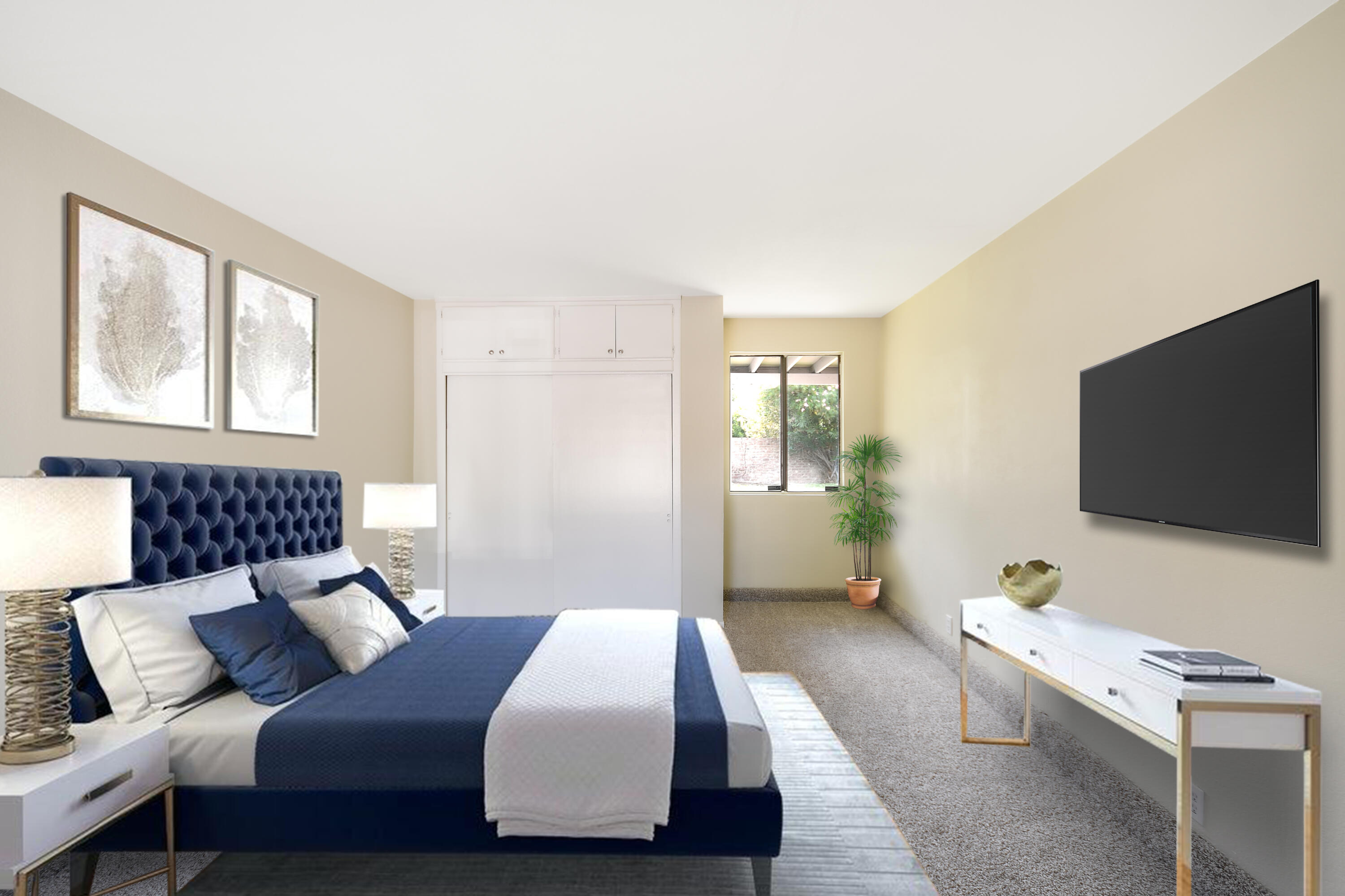 44325 3rd Street East Lancaster, CA 93535 - Photo 6 of 15 a bedroom with a bed and a flat screen tv