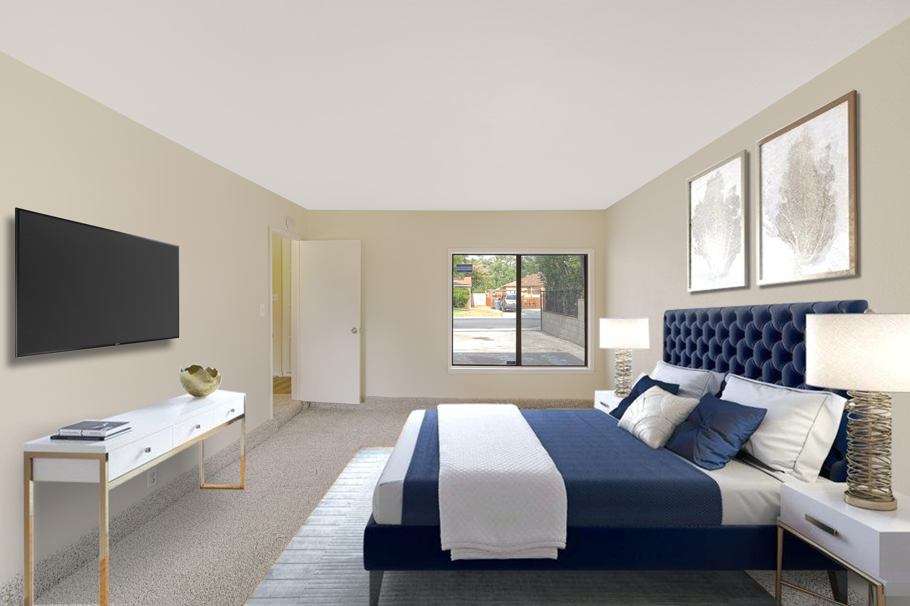 44325 3rd Street East Lancaster, CA 93535 - Photo 7 of 15 a bedroom with a bed and a flat screen tv