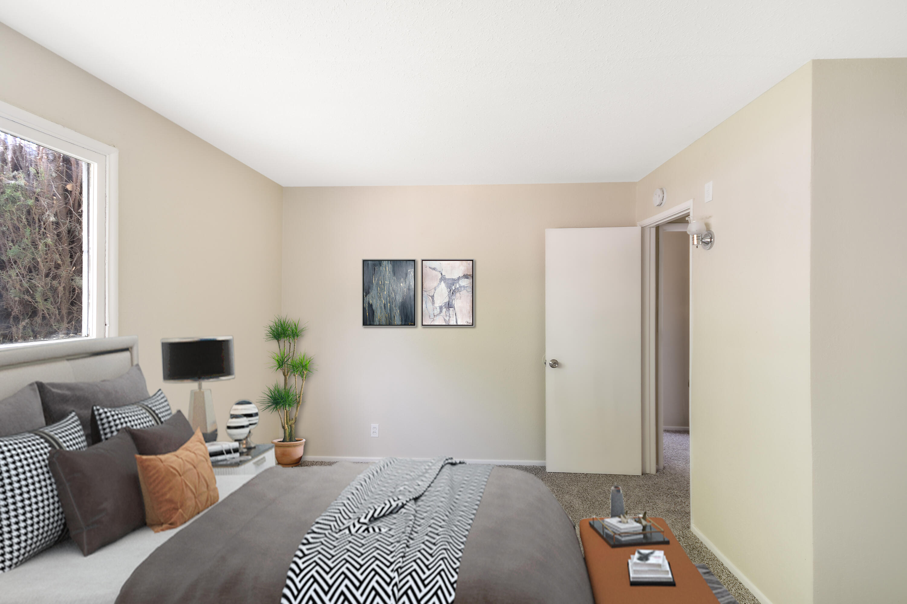 44325 3rd Street East Lancaster, CA 93535 - Photo 10 of 15 a bedroom with a bed and a window