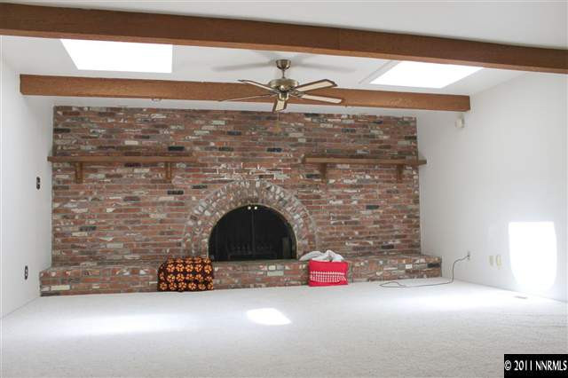 4215 Lakeside Drive Reno, NV 89509 - Photo 10 of 13 a view of empty room with fireplace