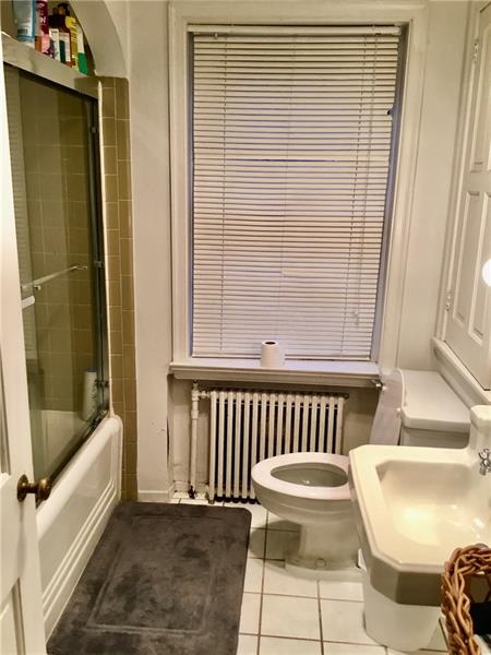 303 South Second Street Apollo, PA 15613 - Photo 15 of 25 a bathroom with a sink and a bathtub