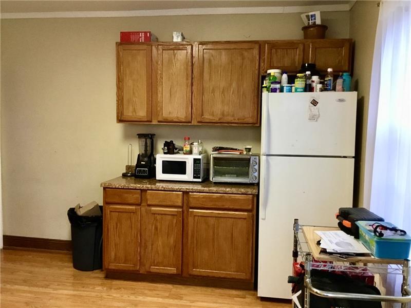303 South Second Street Apollo, PA 15613 - Photo 20 of 25 a kitchen with stainless steel appliances granite countertop a refrigerator and a stove