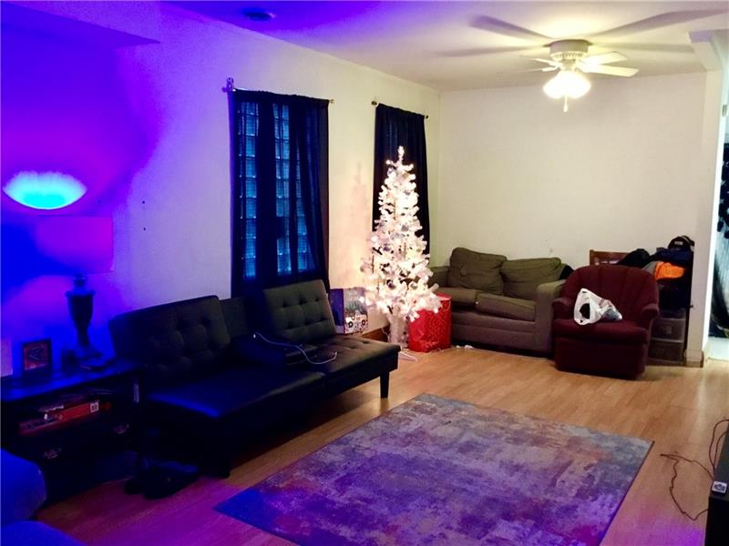 303 South Second Street Apollo, PA 15613 - Photo 22 of 25 a living room with furniture rug and a lamp