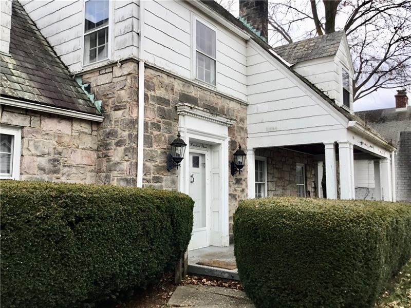303 South Second Street Apollo, PA 15613 - Photo 4 of 25 a view of a brick house with a large windows