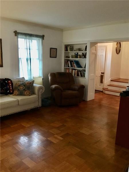 303 South Second Street Apollo, PA 15613 - Photo 9 of 25 a living room with furniture and a large window