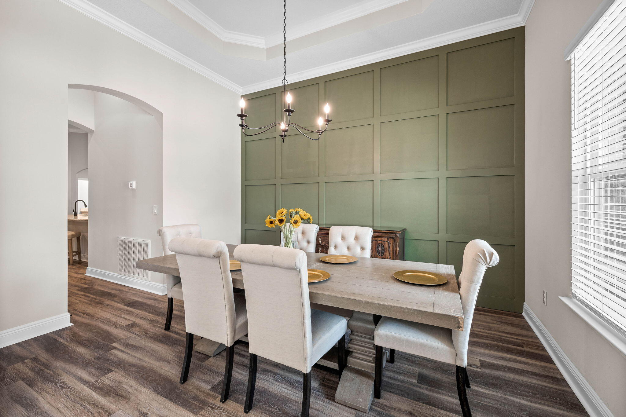 1297 Brushed Dune Circle Freeport, FL 32439 - Photo 11 of 73 a view of a dining room with furniture and wooden floor