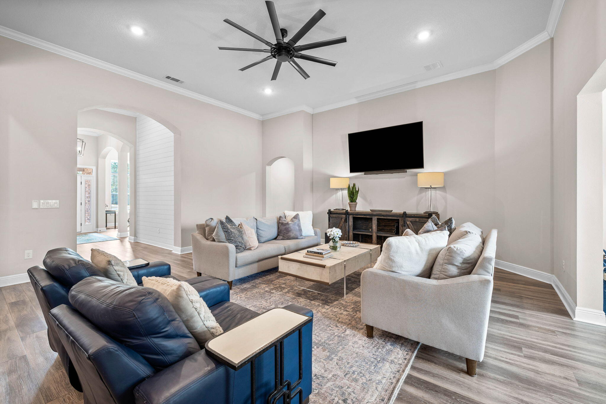 1297 Brushed Dune Circle Freeport, FL 32439 - Photo 18 of 73 a living room with furniture and a flat screen tv