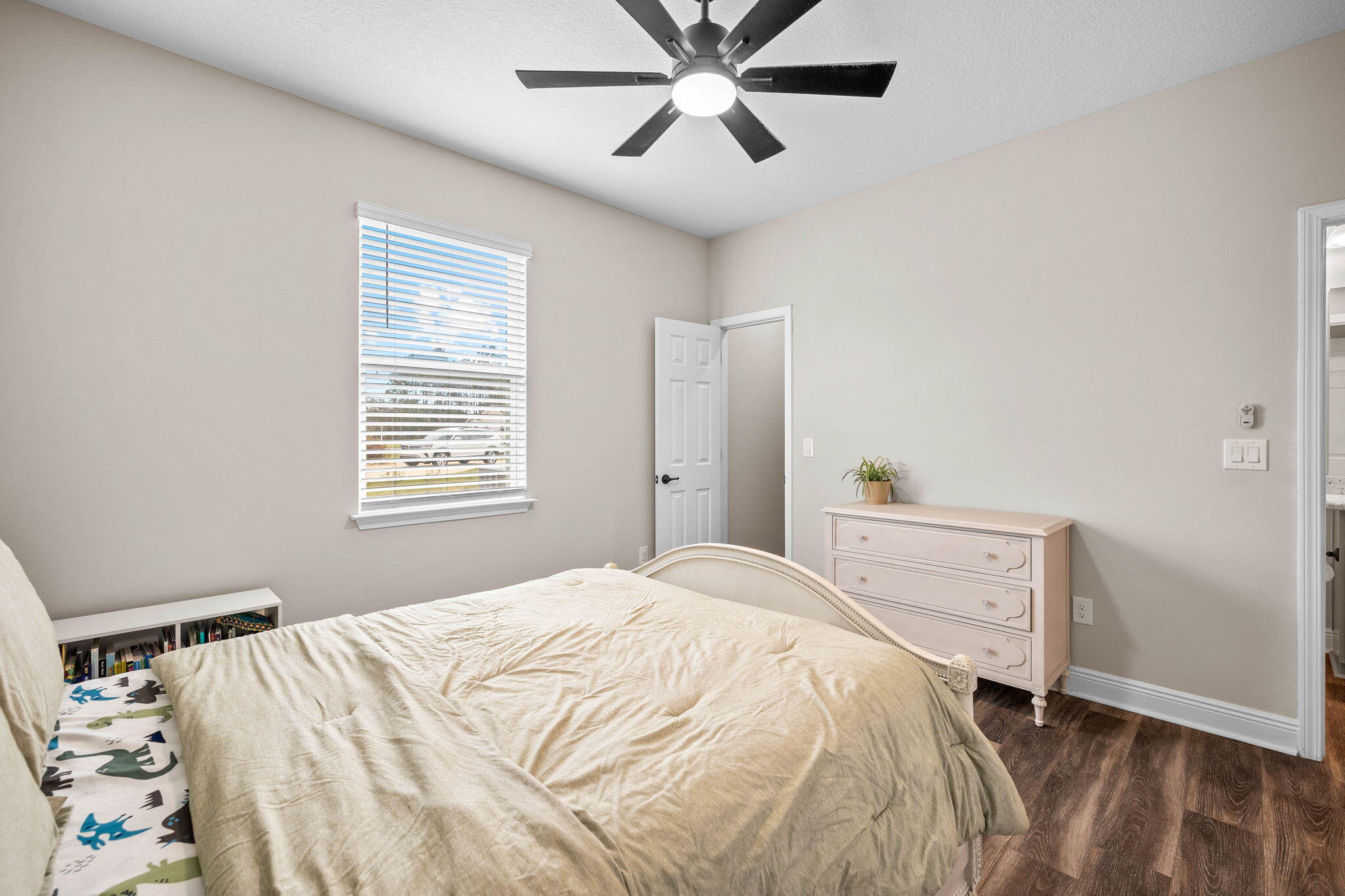 1297 Brushed Dune Circle Freeport, FL 32439 - Photo 47 of 73 a bedroom with a bed and window