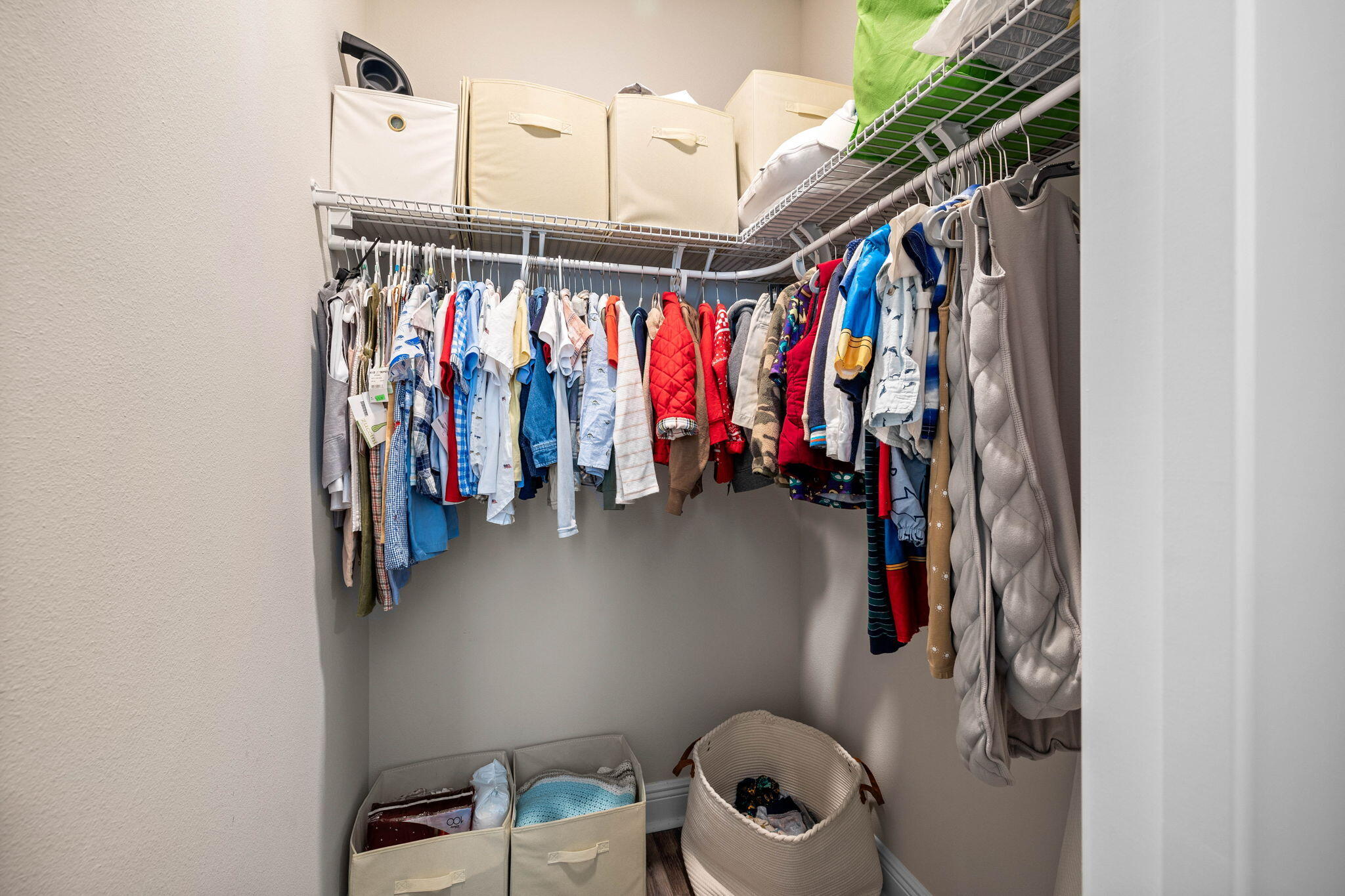 1297 Brushed Dune Circle Freeport, FL 32439 - Photo 48 of 73 a view of walk in closet with clothes and shoes