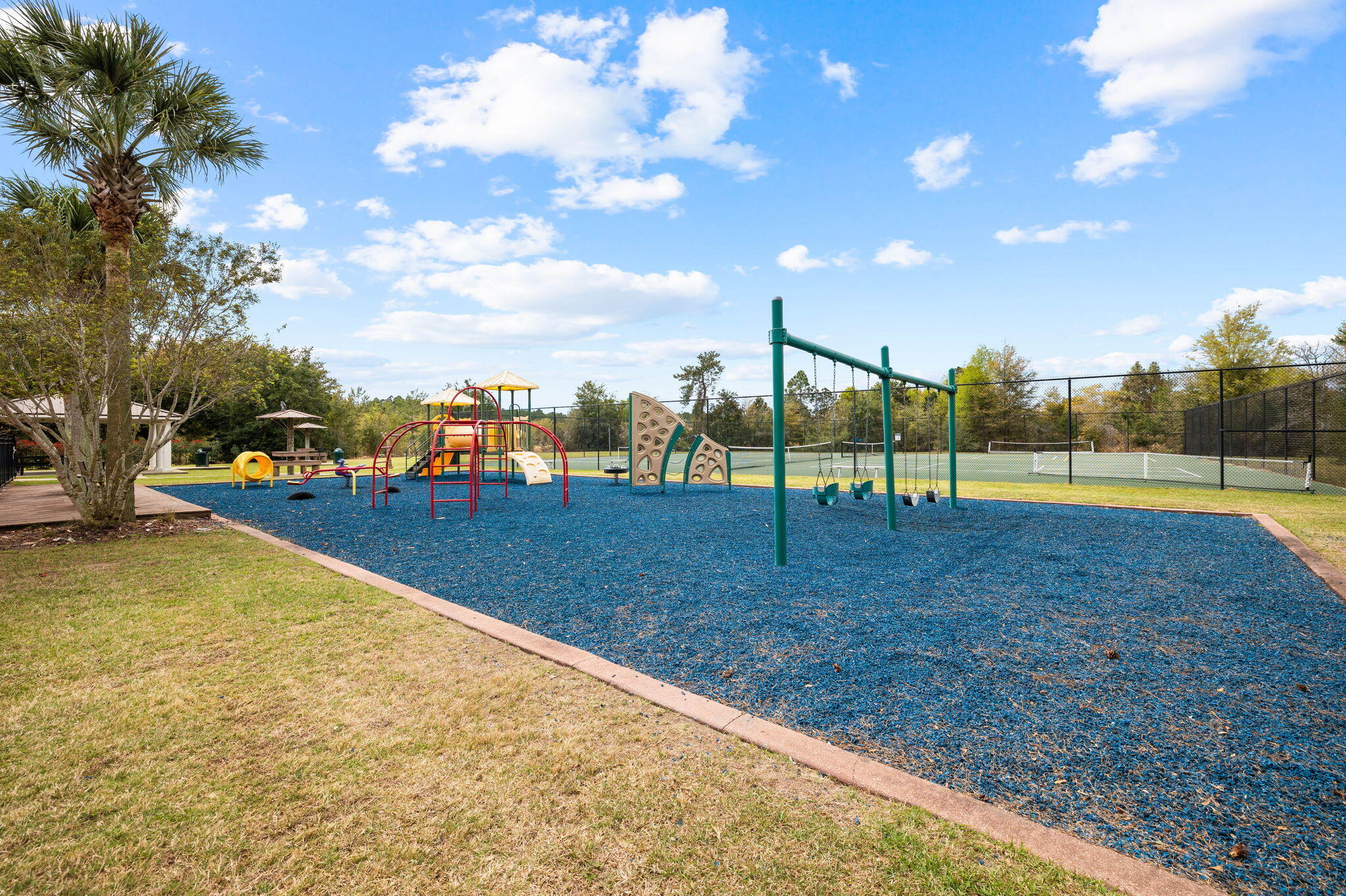 1297 Brushed Dune Circle Freeport, FL 32439 - Photo 57 of 73 a view of outdoor space with playground and green space