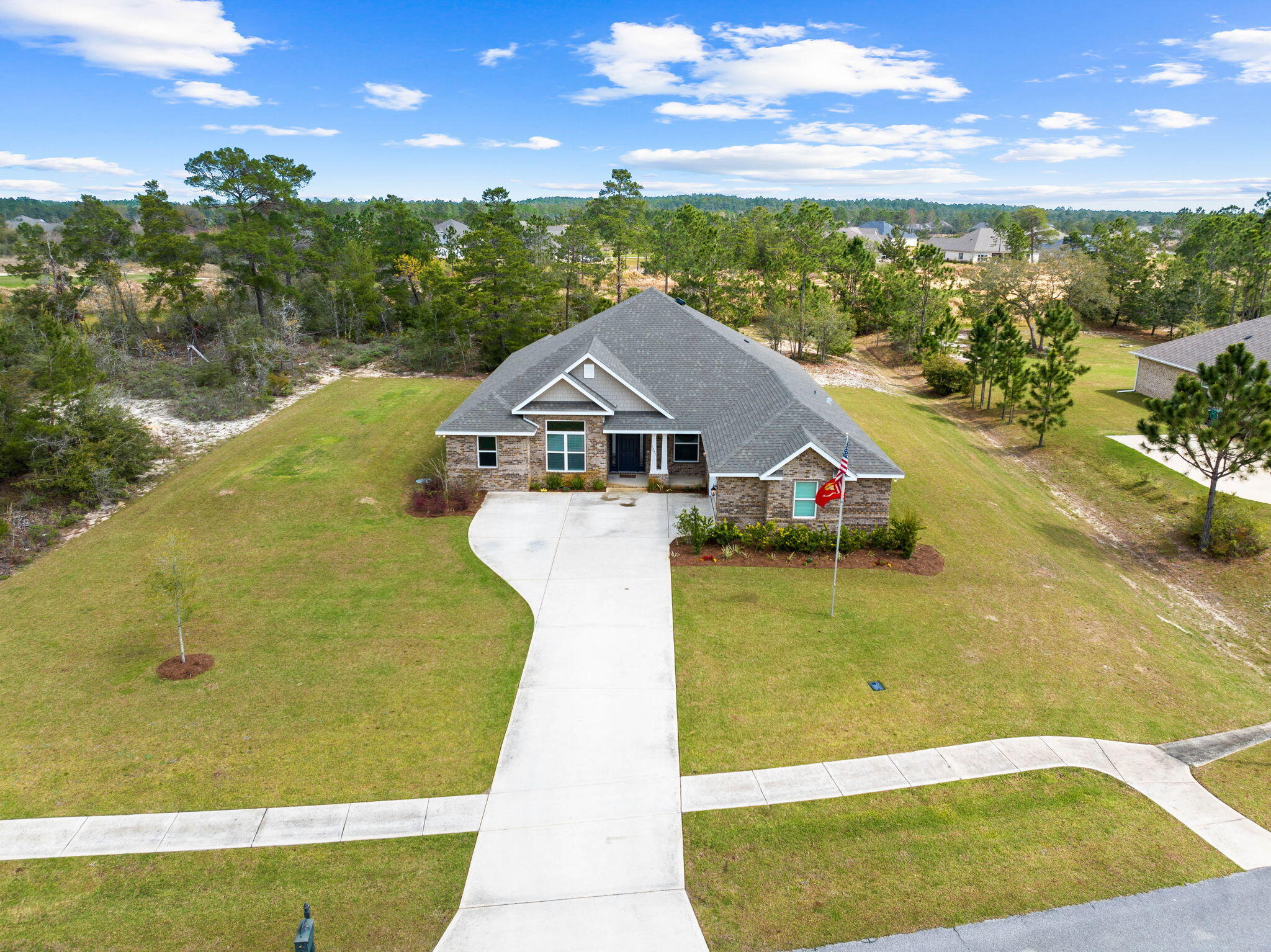1297 Brushed Dune Circle Freeport, FL 32439 - Photo 66 of 73 a view of a swimming pool with an outdoor seating and yard