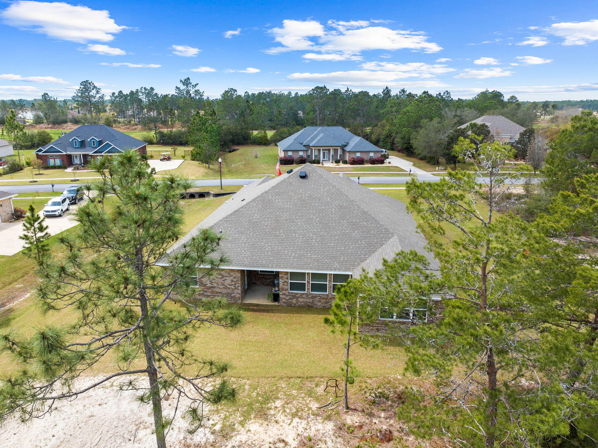 1297 Brushed Dune Circle Freeport, FL 32439 - Photo 71 of 73 a view of a swimming pool with a yard