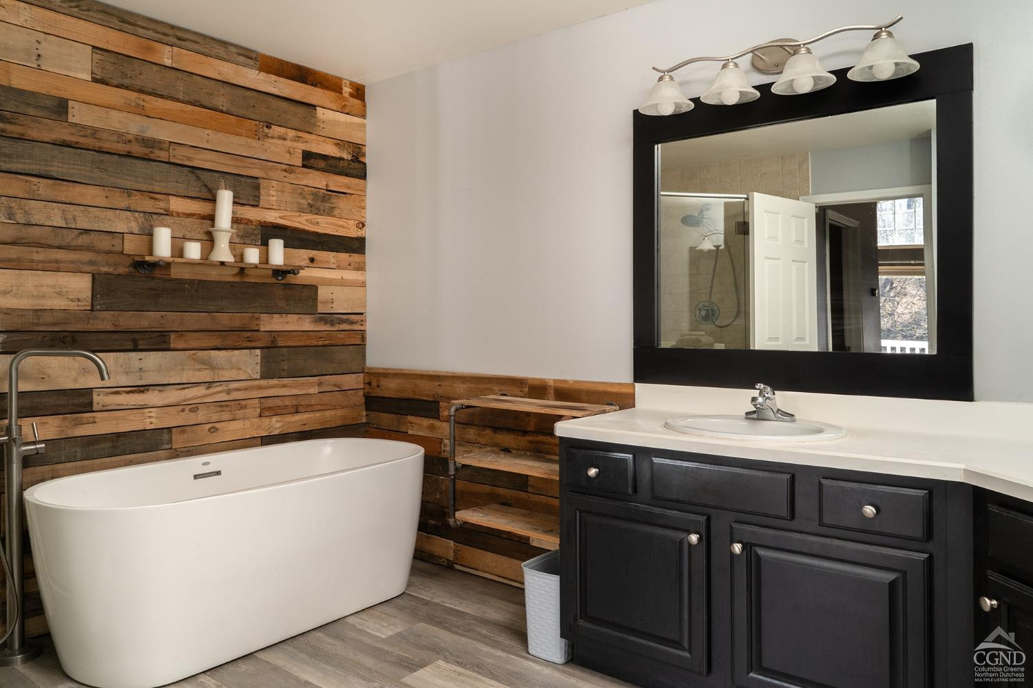 19 Marina Drive Catskill, NY 12414 - Photo 5 of 10 a bathroom with a sink and a mirror