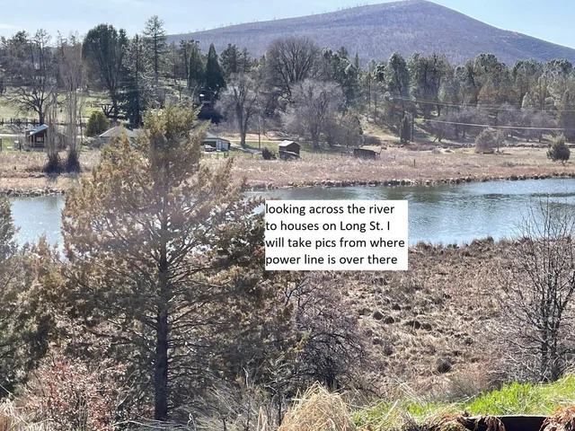 a view of a street with a yard of it