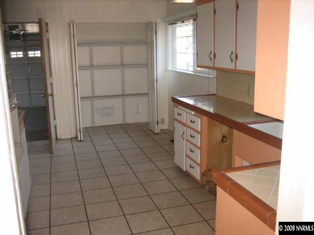 1855 Watt Street Reno, NV 89509 - Photo 3 of 5 a kitchen with stainless steel appliances cabinets and stove