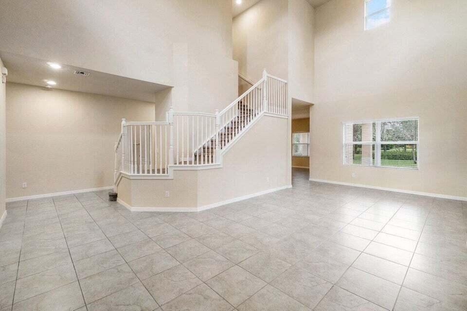 107 Chub Cay Way Jupiter, FL 33458 - Photo 9 of 15 INTERIOR STAIRWAY