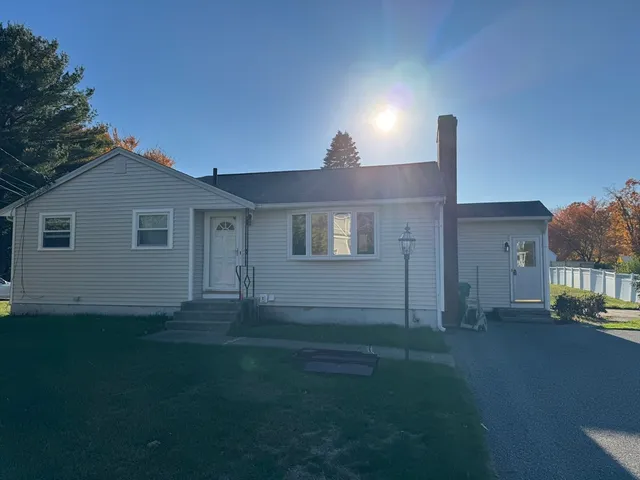 a house view with a garden space